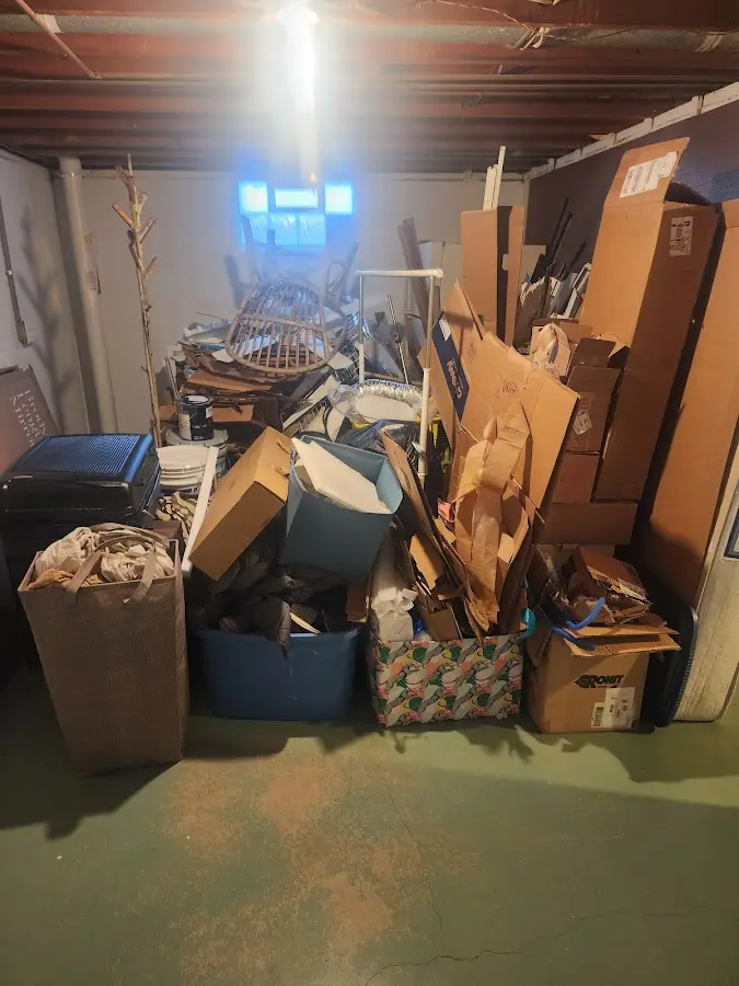 Roll-off dumpster container at job site for Yard Waste Dumpster Rental in Highland City